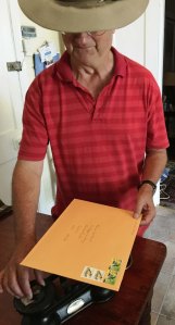 Uncle Richard displays the latest in modern techology of stamp selling.