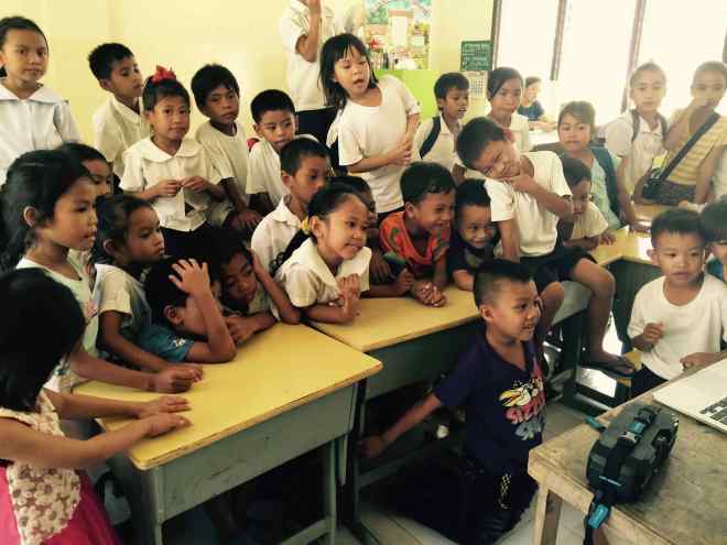 Two weeks after the party I took the video of the kids into the classroom and they watched on my laptop.