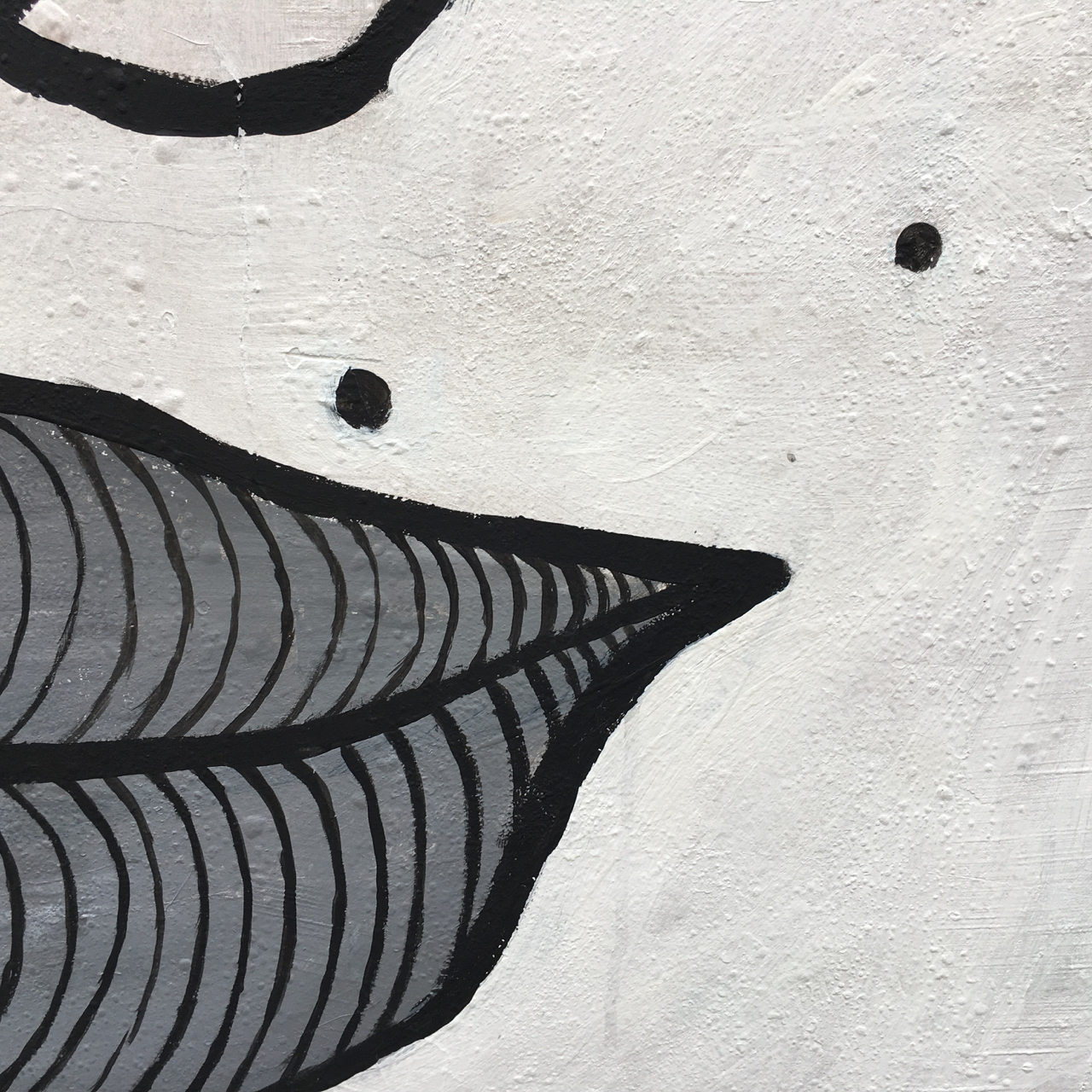 pop art style black and white mural of a woman's lips