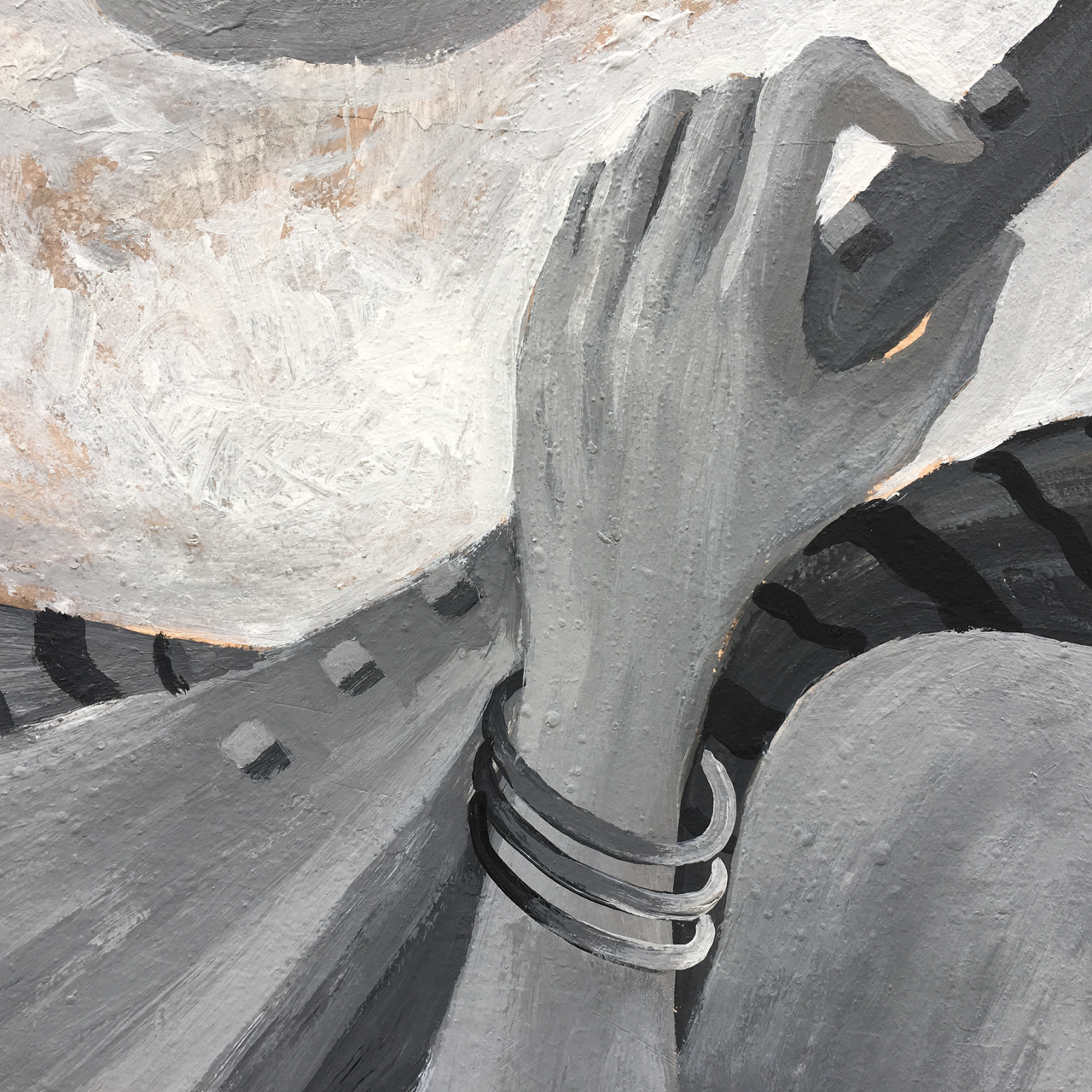 black and white mural of a woman's hand playing a lute
