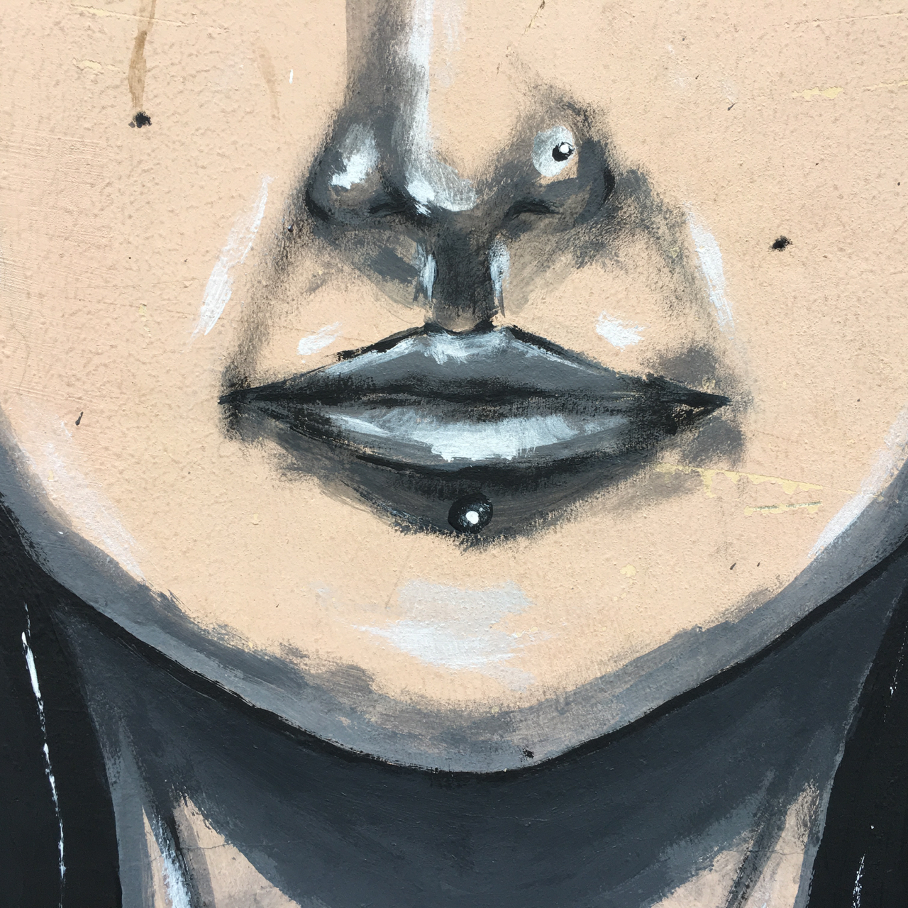 mural of a woman's lips, nose and chin