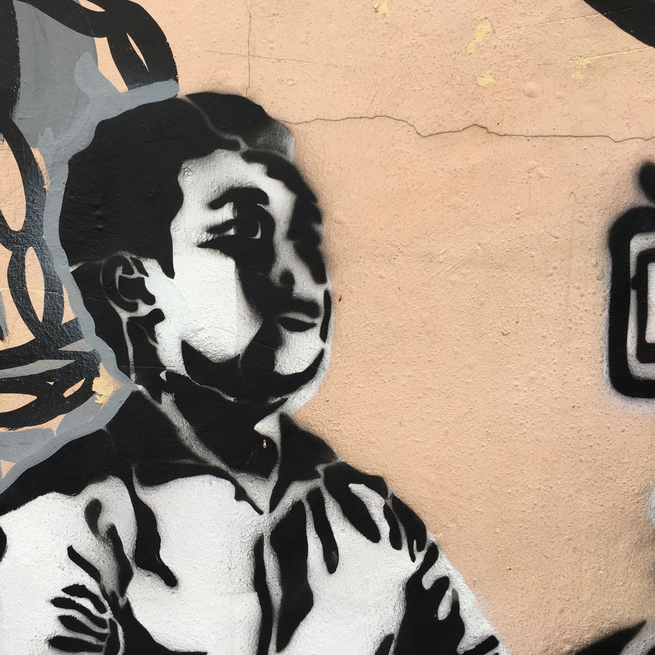 mural outline of a young man looking up