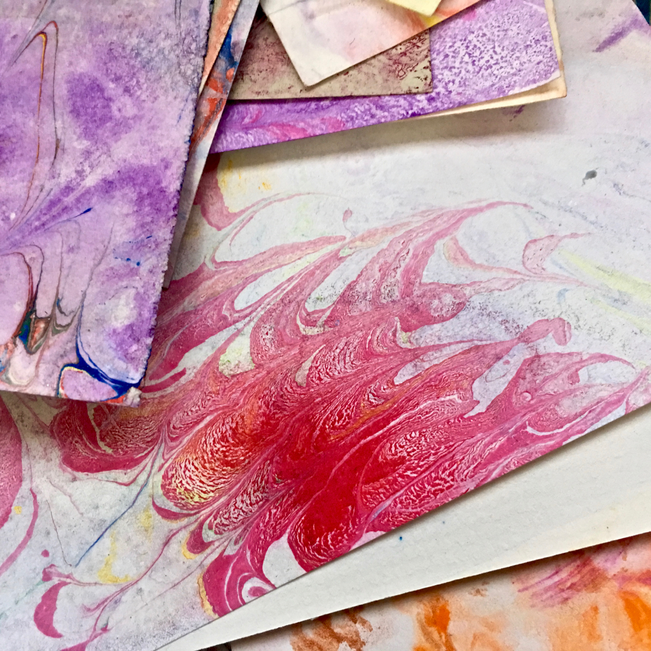 box of paper with marbled designs