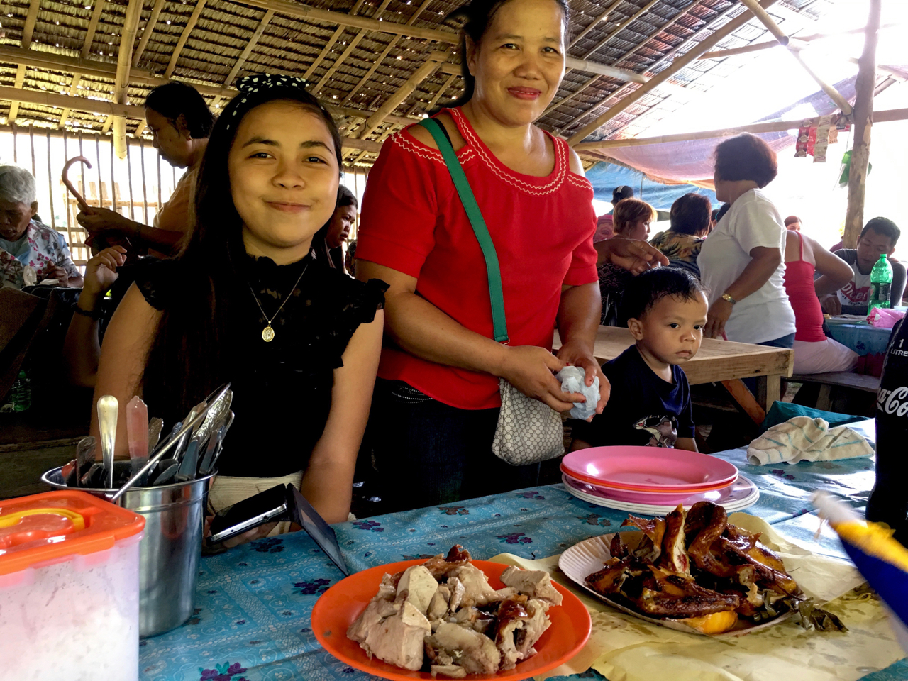 plates of pork and native chicken for lunch
