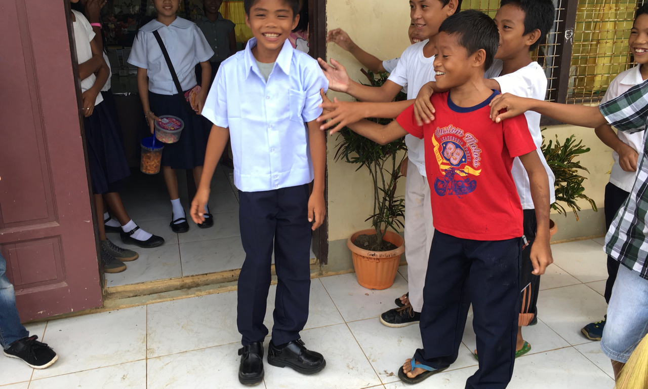 Filipino boy in his new school uniform