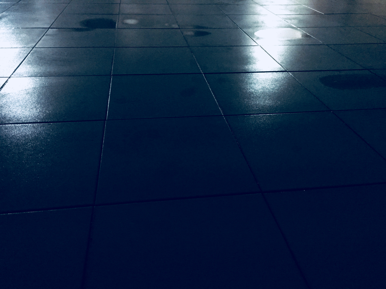 wet balcony at night