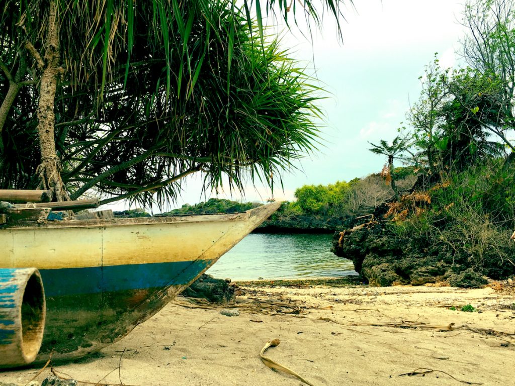 bow of a bamboo boat on a small island